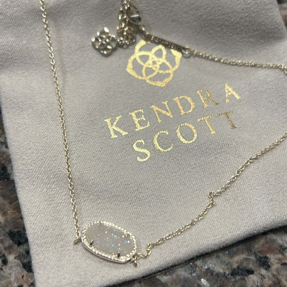 White topaz crystal oval kendra Scott necklace, silver chain.